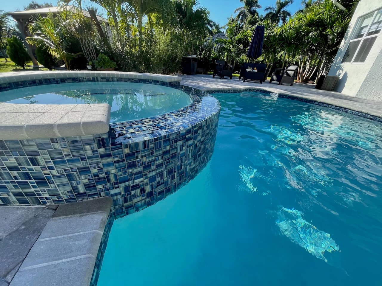 Pool renovation and outdoor living project photo 13 - Blue Clair Pool South Florida